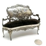 1901 silver model of a salon sofa / pin cushion with Reynolds winged childrens heads decoration by