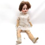 Large antique bisque headed doll - 80cm long with obvious wear and 1 finger detached (but present)