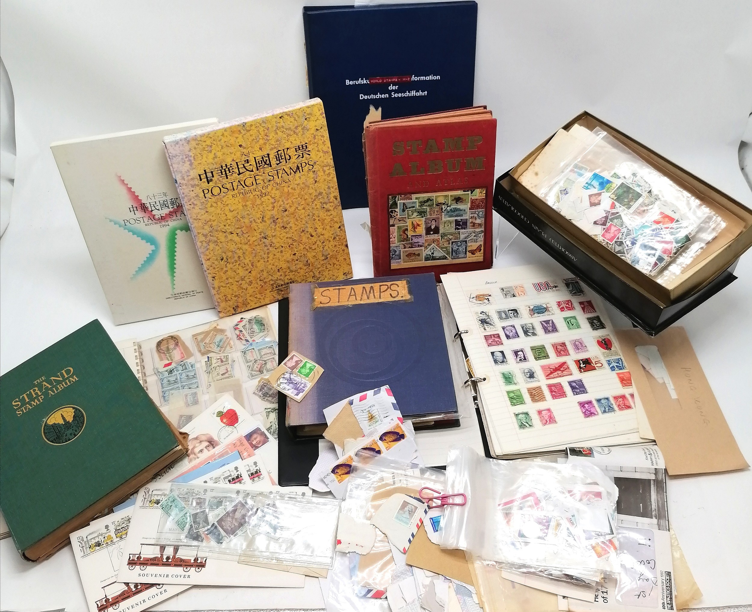 Qty of stamp albums, loose stamps, covers, 1992 + 1994 China year books etc