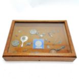 Oak table top display cabinet (35cm x 25cm) with numerous items inc acorn propelling pencil,