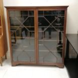 Large antique astral glazed 2 door cabinet with key 133cm wide x 40cm deep x 142cm high - has 1