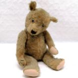 Antique German mohair Teddy bear, play worn condition with replacement felt pads, 57 cm high.