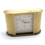 Vintage Swiza 8 day alarm clock in gilded brass case with tambour front - 9cm x 5.6cm ~ works -