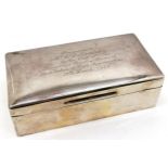 London silver 1933 Cigarette box by Northern Goldsmiths & Co, with inscription to top, 17 cm wide, 9