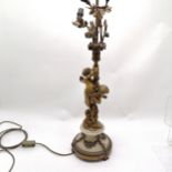 Original bronze cast lamp with cherub figural detail on a white marble base - height to shade post