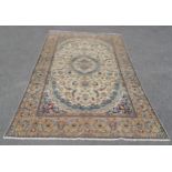 Fine Nain cream ground wool rug with central medallion and floral detail 260cm x 204cm