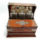 Antique oak tantalus (with key) & 3 decanters & sprung action drawer & fold out lids with metal
