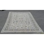 Fine Kashan cream grounded rug with blue floral decoration 250 x 368cm