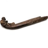 Antique African hand carved figural canoe decoration depicting a crocodile eating a monkey 45cm