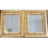 Pair of antique gilt decorated frames 56cm x 46cm with later mirror plates framed with relief molded