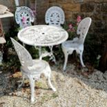 Aluminium white painted circular table and 4 chairs with fleur de lis design, table 80cm diameter