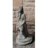 Seated figure of a lady on a square base 59cm high