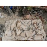 Large scale wall panel depicting an Eastern scene in moulded concrete, made in parts that attach