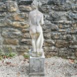 Figure of a standing semi clad maiden on a 2 part pedestal - total height 116cm figure 80cm high