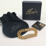 Elvis jewellery collection by Lowell Hays ID bracelet in gold tone, with original box , pouch and