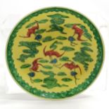 Oriental Japanese hand decorated in Hong Kong bowl with 5 bat & purse detail on green / yellow