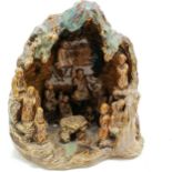 Chinese / Oriental 19th century or earlier high fired pottery grotto with multiple figural detail