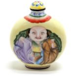 Oriental unusual enamel yellow grounded snuff bottle with metamorphic image and script to base - 7cm
