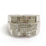 Impressive unmarked (touch tests as 14ct) white gold ring set with 118 diamonds (94 princess cut &