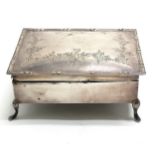 Silver hallmarked jewellery box on 4 feet & engraved decoration to lid and velvet interior (a/f) -