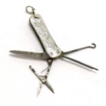 Unusual antique 1902 silver cased combination penknife / scissors / pick and file / buttonhook -