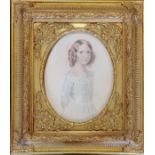 Oval watercolour portrait of a girl in a white dress in later gilt frame- frame size 40cm x 35cm- no