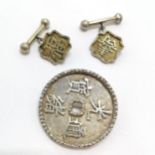 Chinese silver pair of cufflinks t/w unmarked silver round brooch with 4 character decoration (