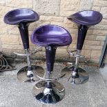 3 Adjustable chrome bar stools with purple seats by Stefix home furniture. Measuring 85cm high fully