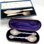 Pair of silver plated berry spoons with snake detail to handle (in original 28.5cm long box - lid