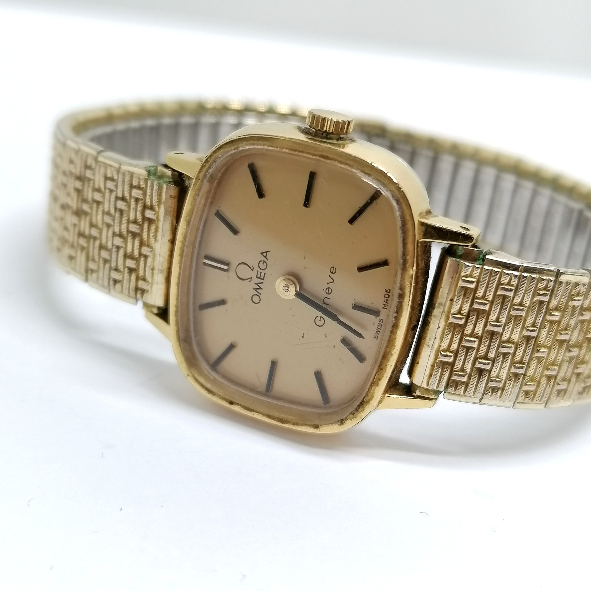 Omega mid-size manual wind wristwatch with 625 movement in a gold plated case on a stretchy