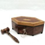 Good quality elongated hexagon shaped box terminating on 6 feet containing a turned wooden gavel -