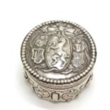 Continental hallmarked silver circular hinged lidded box with embossed decoration with city