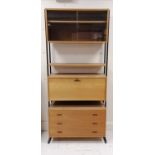 Mid- century teak modular wall unit, the top having sliding glass doors, central unit