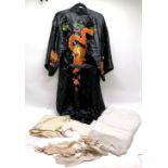 Chinese black silk embroidered kimono, decorated with dragons, size 8, t/w assorted table linen