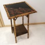 Antique bamboo and lacquered two tier occasional table, 42 cm diameter, 71 cm high, in good used