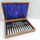 1911 silver bladed set of 6 fish knives & forks with mother of pearl handles by Goldsmiths &