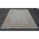 Fine Kashan cream and beige rug with an all over decortaion consisting of flowers. Measures 375cm