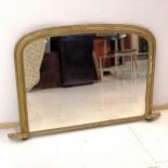 Antique gilt framed over mantle mirror, 125 cm wide, 80 cm high, some losses to frame.