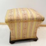 Antique mahogany fabric covered ottoman, with concave sides on bun feet, 48 cm wide, 42 cm deep,