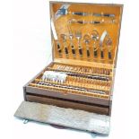 Cased canteen of Thai cutlery, extensive 12 place settings and serving cutlery, all in fitted