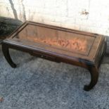 Oriental carved decorated coffee table, with single frieze drawer, decorated with village scene with