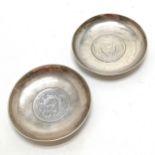 2 x Chinese silver dishes inset with 1869 Peru & 1909 El Salvador coins - 8.5cm diameter & total (2)