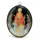 Antique religious icon with hand stitched gold braid detail with convex glass front to frame -