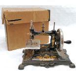 Vintage German Child's sewing machine, with original box, in good used condition.
