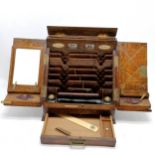 Antique oak stationery cabinet by Parkins & Gotto Oxford Street London. Has original inkwells,