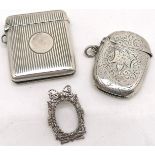 2 x silver vestas (largest 4.8cm x 4.2cm) - both have slight dents t/w silver miniature frame set