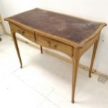 Antique satinwood writing table with burgundy leather insert to top, bearing ring marks, 92 cm wide,