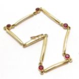 18ct hallmarked gold bracelet set with ruby by JD - 16cm & 5g total weight