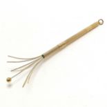 9ct marked gold swizzle stick - 13cm extended & 6.7g total weight