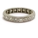 Unmarked white gold (touch tests as 18ct) diamond set eternity ring - size L & 3.7g total weight ~